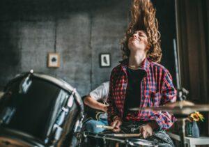 Teenager Playing Rock and Roll At Home